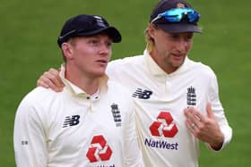 Yorkshire and England pair, Joe Root (right, the national team captain) and Dom Bess who posted figures of 5-30 against Sri Lanka. Picture: Stu Forster/NMC Pool/PA Wire.