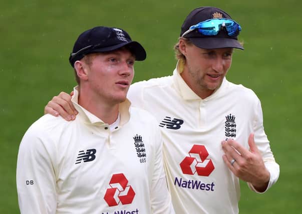 Yorkshire and England pair, Joe Root (right, the national team captain) and Dom Bess who posted figures of 5-30 against Sri Lanka. Picture: Stu Forster/NMC Pool/PA Wire.