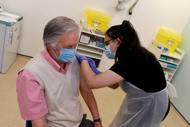 Colin Watson receives his Covid vaccine at Boots in Halifax. Photo: Simon Hulme.