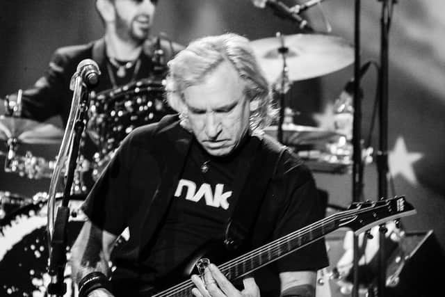 Starr on stage with Joe Walsh, at the Ryman in Nashville, during a concert in 2014.(Picture: Scott Ritchie/Julien’s Auctions).