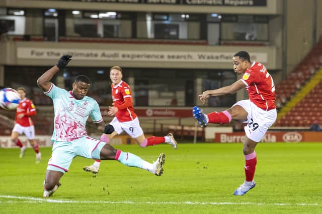 Barnsley's Victor Adeboyejo fires his shot just over the bar.  Picture Tony Johnson