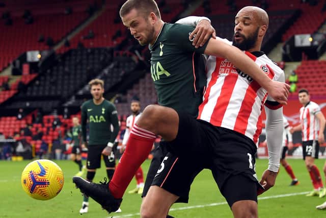 Tottenham Hotspur's Eric Dier and Sheffield United's David McGoldrick (right) battle for the ball.