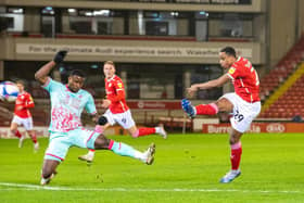 Barnsley's Victor Adeboyejo fires in at goal. (PIC: TONY JOHNSON)