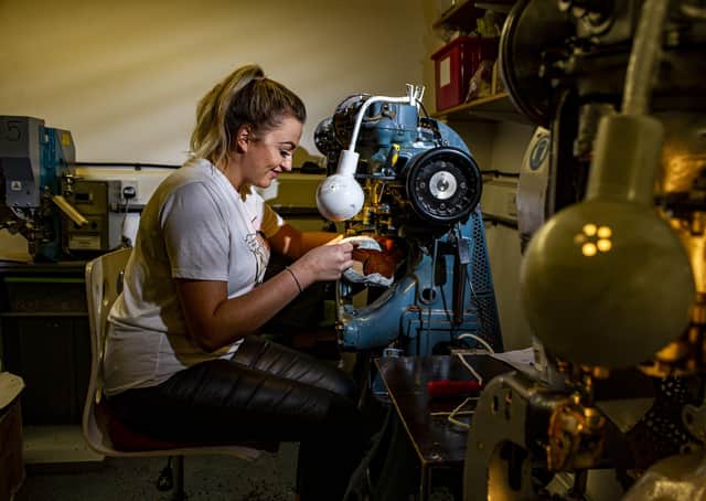 Kamila Kluska, Goral production manager and great granddaughter of the founder, inserts the eyelets for a pair of men's hybrid shoes at Sheffield-based family footwear company Goral. Picture by Tony Johnson.