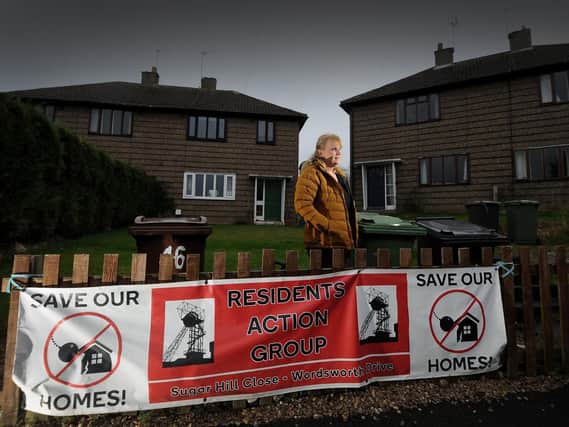 Cindy Readman outside the home she looks set to lose after the estate owners won permission to demolish all the houses there.