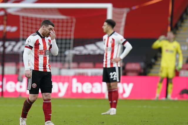 SLIPPING AWAY: Sheffield United's John Fleck shows his frustration during the 3-1 defeat to Tottenham Hotspur at Bramall Lane. Picture: Andrew Yates/Sportimage