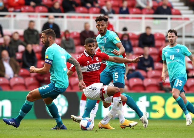 CLOSING IN: Middlesbrough's Ashley Fletcher (second left). Picture: Owen Humphreys/PA