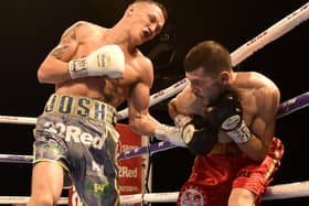 Josh Warrington out-punching Sofiane Takoucht at Leeds Arena in October 2019. Picture: Steve Riding.