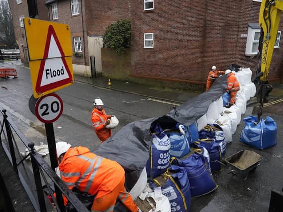 Flood defence preparations are underway in York as residents reassured if they need to evacuate they will not be fined.