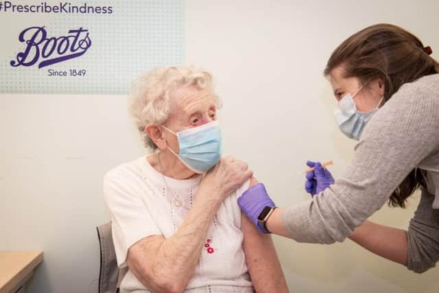 Brenda Clegg receiving her vaccination