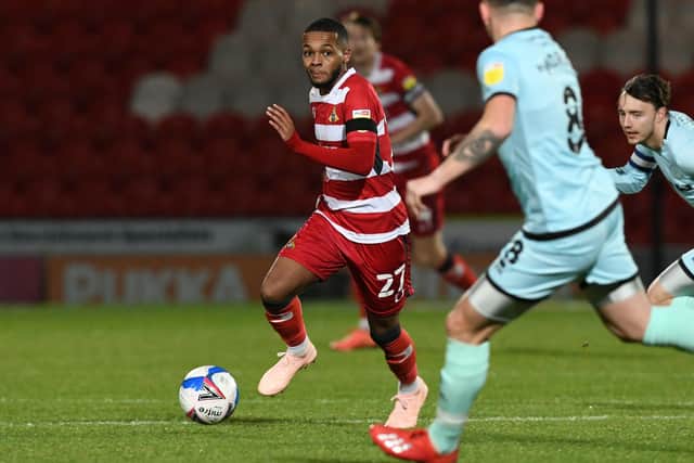 AMBITIOUS: Doncaster's AJ Greaves, in action against Rochdale at the Keepmoat on Tuesday. Picture: Howard Roe/AHPIX LTD