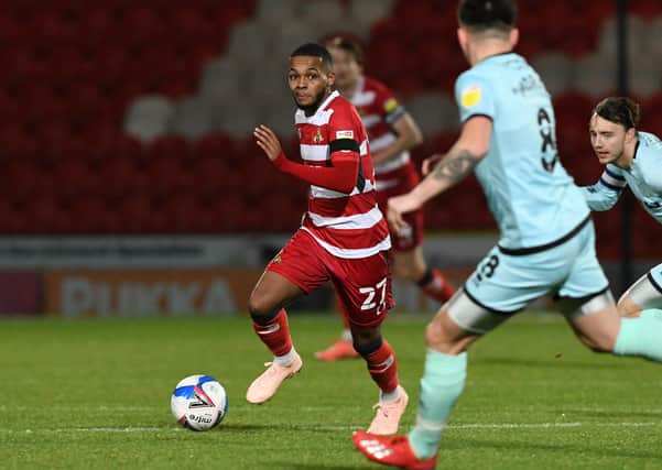 AMBITIOUS: Doncaster's AJ Greaves, in action against Rochdale at the Keepmoat on Tuesday. Picture: Howard Roe/AHPIX LTD