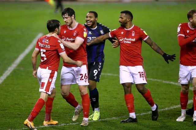 FLASHPOINT: Nottingham Forest's Yuri Ribeiro (left) is separated from Middlesbrough's Britt Assombalonga as they exchange words at the City Ground. Picture: Tim Goode/PA