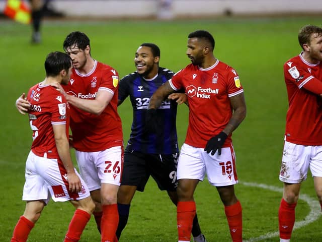 Nottingham Forest's Yuri Ribeiro (left) is separated from Middlesbrough goal-scorer Britt Assombalonga at the City Ground. Picture: Tim Goode/PA