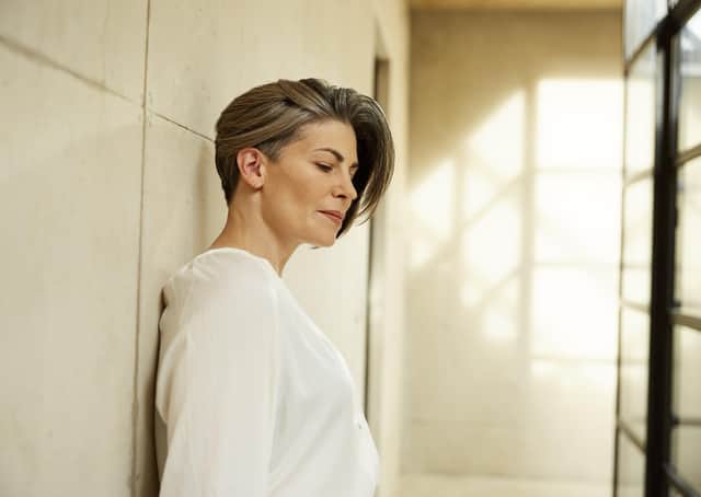 Sabrina Golonka, a university lecturer from Leeds, one of the campaign images from the Wella shoot, showing how she can achieve different tones depending on where she parts her hair.