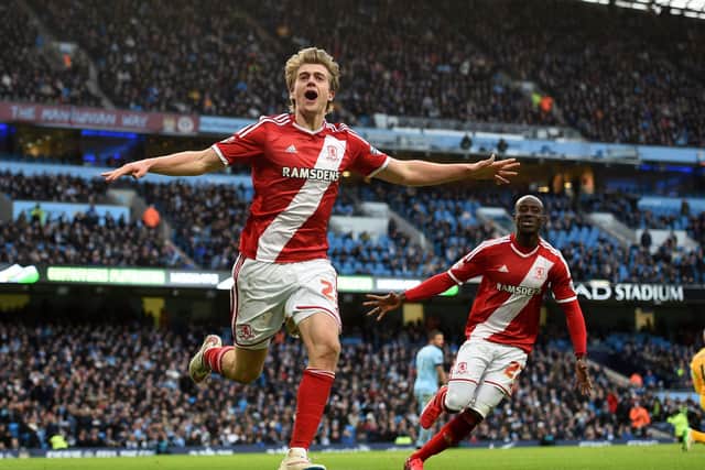 TARGET MAN: Middlesbrough's Patrick Bamford celebrates scoring his side's first goal against Manchester City at the Etihad Stadium. Picture: Martin Rickett/PA