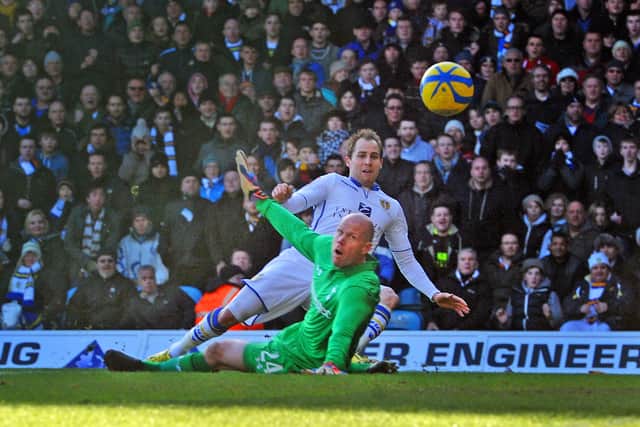 OPENING SALVO: Leeds' Luke Varney puts the ball past Brad Fridel to score his team's first goal against Tottenham back in January 2013, the hosts eventually winning 2-1. Picture: Tony Johnson.