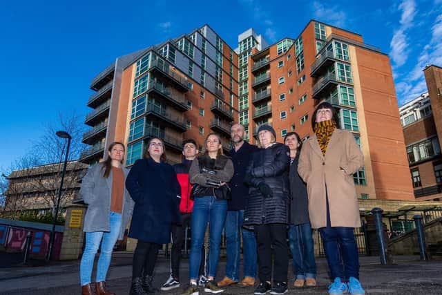 Hayley Tillotson, second left, has now lost her flat at the St George Building and has declared bankruptcy but she is still helping her former neighbours fight for justice.