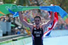 Crowning moment: Alistair Brownlee holds aloft the British flag, the Yorkshire flag and the winner’s tape after crossing the line first to win his second Olympic triathlon title in Rio five years ago. Will he be able to defend it this summer? (Pictures: Alex Livesey/Getty)