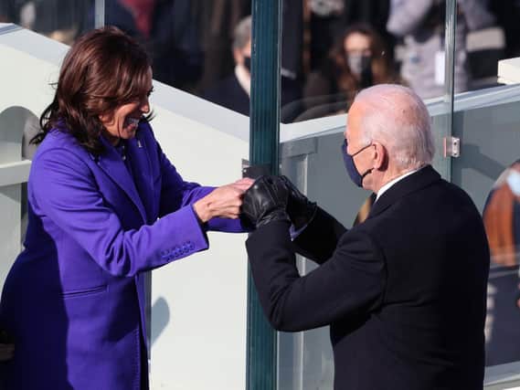 Vice President Kamala Harris celebrates with Joe Biden after being sworn in during the inauguration on the West Front of the US Capitol in Washington, DC. (Getty Images).