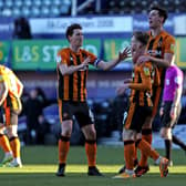 Hull City players celebrate their side's first goal of the game, scored by Portsmouth's Jack Whatmough at Fratton Park. Picture: Kieran Cleeves/PA