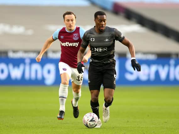 Doncaster Rovers striker Fejiri Okenabirhie pictured in action at West Ham. Picture: Nigel French/PA.