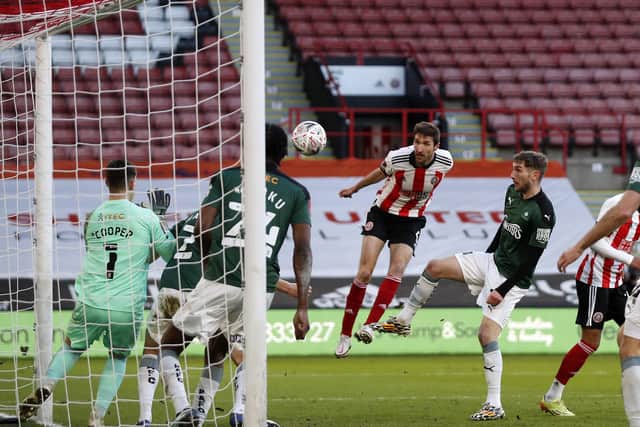 OPENING SHOT: Sheffield United's Chris Basham scores his side's first goal at Bramall Lane. Picture: Darren Staples/Sportimage