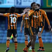 Hull City players celebrate their third goal of the game, scored by Portsmouth's Jack Whatmough at Fratton Park. Picture: Kieran Cleeves/PA