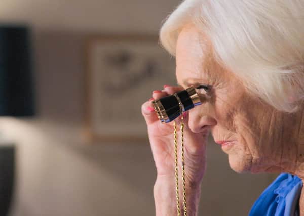 Mary Berry, uses vintage opera glasses to cast her eye on the detail of the celebrities’ ingredients, techniques and culinary skills from the mezzanine, a vantage point shared with judges Angela Hartnett and Chris Bavin. Picture: PA Photo/BBC/Keo Films.