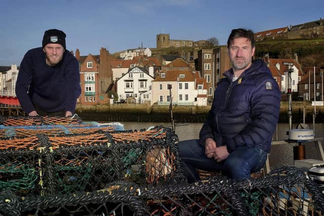 Business partners Luke Russell and Terry Pearson on the vessel in Whitby harbour Picture: Richard Ponter