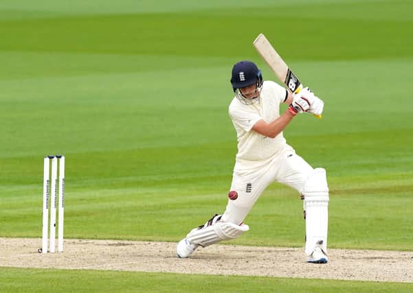 England captain Joe Root in action at Old Trafford last summer. Picture: Jon Super/NMC Pool/PA