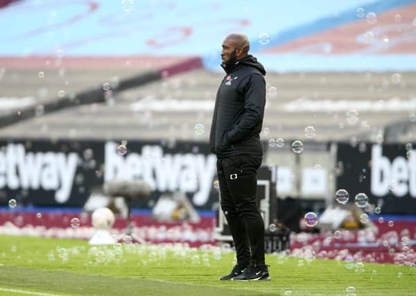 Doncaster Rovers manager Darren Moore watches from the touchline. Picture: PA.