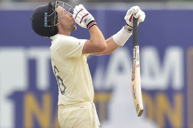 TOUGH GOING: England's Joe Root calls for some refreshments in the searing heat on his way to a century against Sri Lanka in the second Test match in Galle. Picture courtesy of Sri Lankan Cricket via ECB.