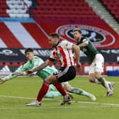 Sheffield United's Billy Sharp scores his side's second goal against Plymouth Argyle in the FA Cup match at Bramall Lane. Picture: Darren Staples/Sportimage