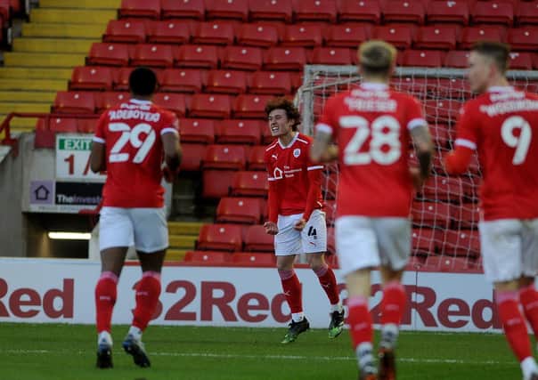 WINNER: Callum Styles celebrates scoring what proved to be the winning goal in the FA Cup against Norwich City at Oakwell on Saturday. Picture: Simon Hulme
