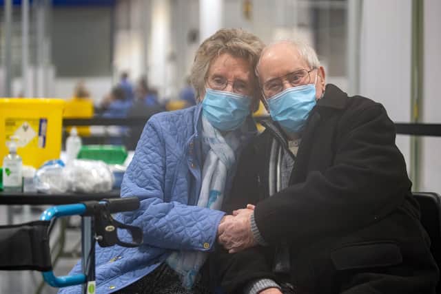 Geoff Holland, 90, and Jenny Holland, 86, from Mansfield after receiving their injections of the Oxford AstraZeneca coronavirus vaccine at a former Wickes store in Mansfield, Nottinghamshire.