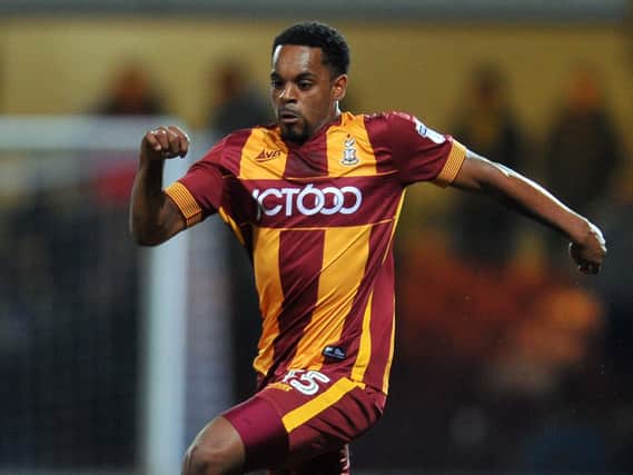Tyrell Robinson seen playing for Bradford City in orange and red in March 2018.