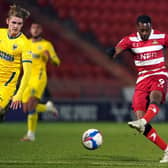 Doncaster Rovers' Fejiri Okenabirhie nets his side's first. (PA)