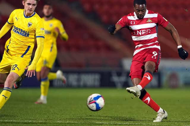 Doncaster Rovers' Fejiri Okenabirhie nets his side's first. (PA)
