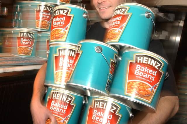 Kraft Heinz - is best known for popular foods including Heinz Baked Beans. Photo credit:  AP Photo/Rick Rycroft