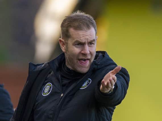 COSTLY: Harrogate Town manager Simon Weaver disagreed with the decision to award Tranmere Rovers a penalty on Tuesday night. Picture: Tony Johnson.
