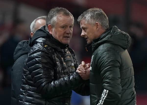 Well done: Sheffield United manager Chris Wilder shakes hands with Manchester United manager Ole Gunnar Solskjaer after the Premier League match at Old Trafford. Picture: PA
