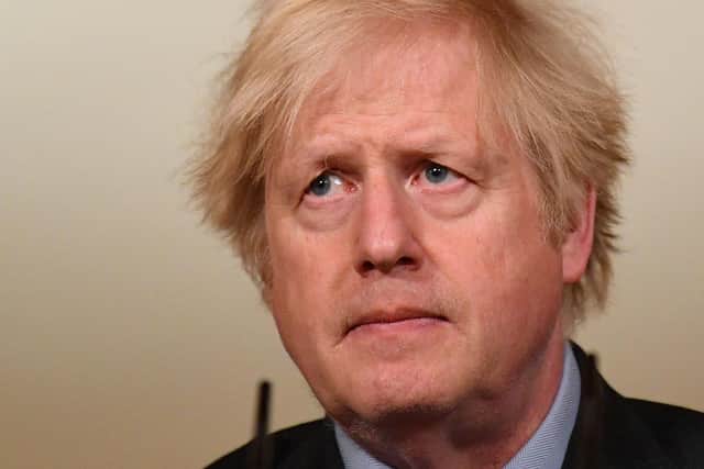 A subdued Boris Johnson after confirming that 100,000 people have died from Covid.