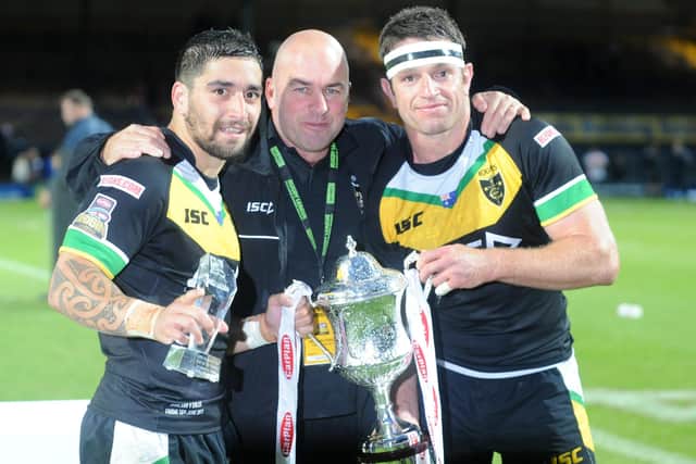 WINNERS: Rangi Chase, Brian McClennan and Danny Buderus celebrate the Exiles win over England at Headingley in June 2011. Picture: Steve Riding.