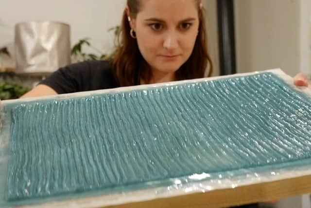 University of Huddersfield student Anna Watkins, who has found a way to use seaweed to make a malleable plastic which can be used for textiles
