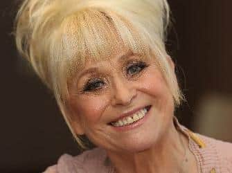 Pictured TV and film Dame Barbara Windsor, who was diagnosed with Alzheimer's disease in 2014, and passed away in December last year aged 83, after her condition worsened.  Dame Barbara and her husband Scott Mitchell have campaigned to raise awareness of dementia, which is most common in people over the age of 65. Photo credit: SWNS