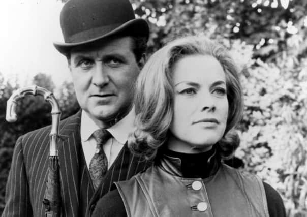 Honor Blackman and Patrick Macnee in the cult 60s series The Avengers.