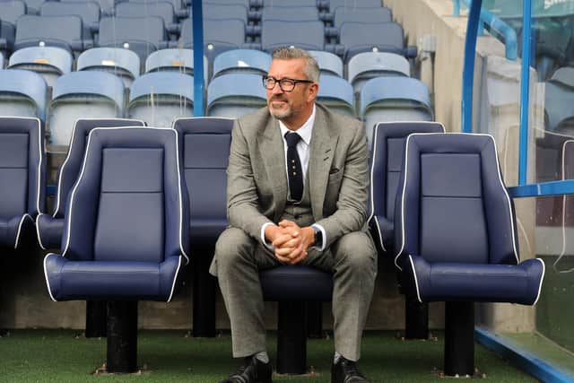 In the dugout: Sean Jarvis during his time as the commercial director of Huddersfield Town.  Picture: Tony Johnson