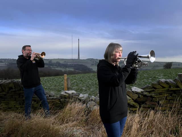 Rachel Taylor with her brother Robert Jagger from Skelmanthorpe Brass Band pictured with their cornets, at Skelmanthorpe. Picture by Simon Hulme