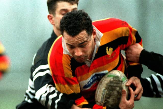 Harrogate's Ralph Zoing is tackled and falls just short of Otley's try line during his rugby union playing days.